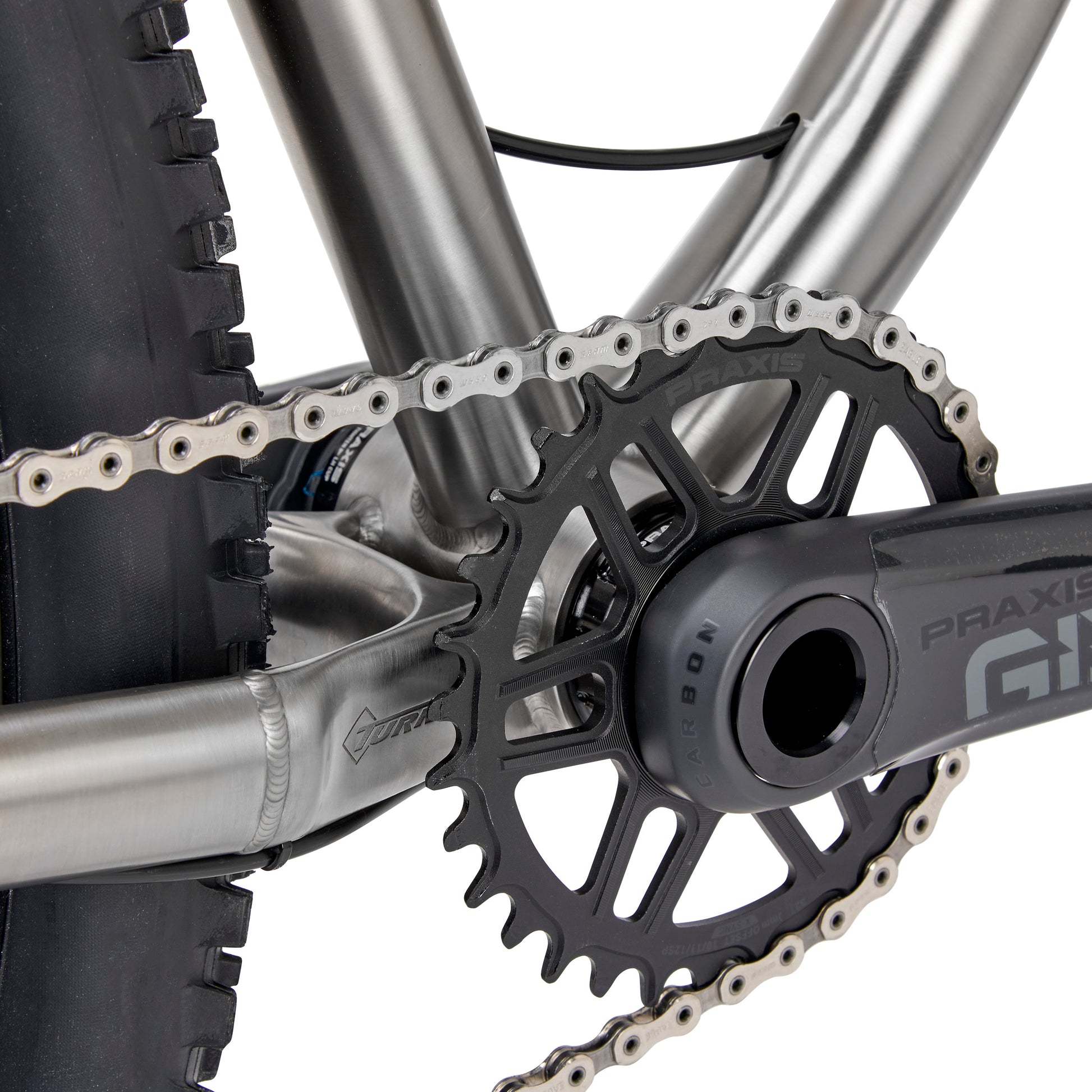 Beautiful 3D printed lower yoke allows for massive tire and chainring clearance. 