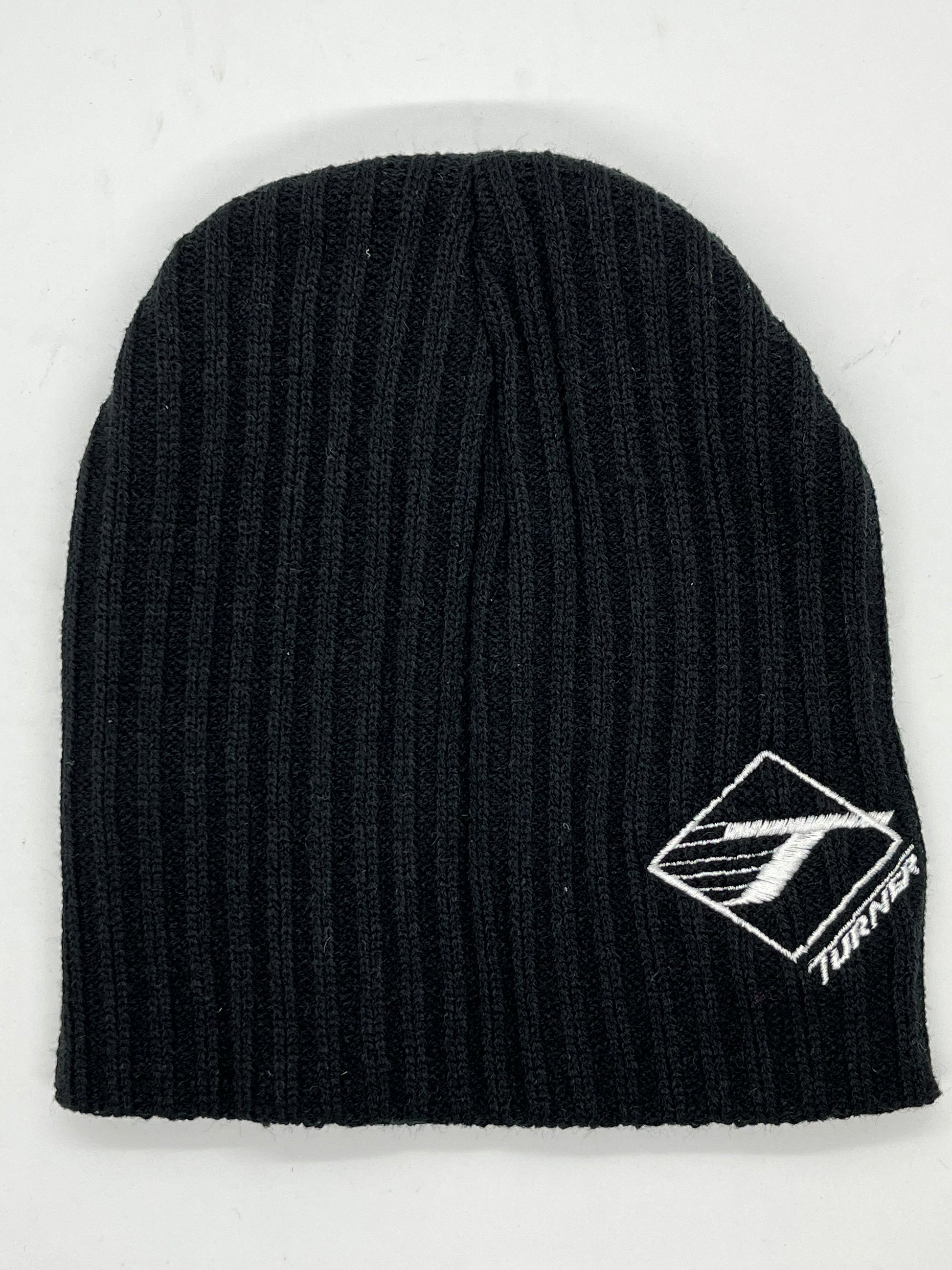 Simple black rib knit beanie with the classic Turner logo. 